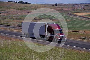 Red Peterbilt Semi-Truck / Loaded Flatbed