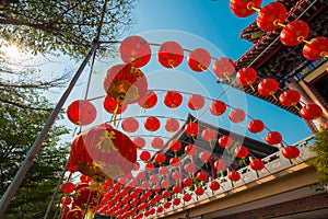 Red pgoda of chinese style temple in Bangkok