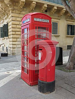 Red phone booth post pillar box
