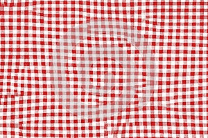 Red picnic blanket fabric with squared patterns and texture