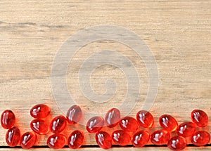 Red Pills Drugs On Wood Table