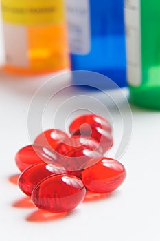 Red pills and prescription bottles