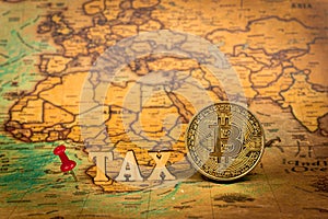 Red pin and bitcoin Tax on world map Investment in cryptocurrency concept