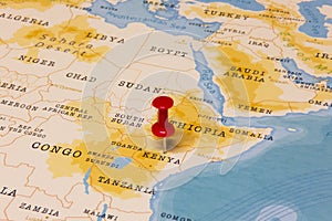 A Red Pin on Kenya of the World Map