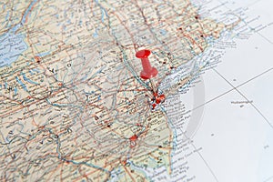 Red pin in a map of the United States pointing out New York as a concept for a desitnation one wishes to go to or has visted photo