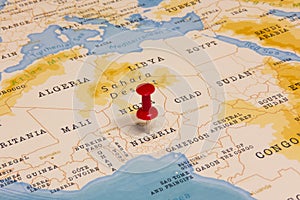 A Red Pin on Nigeria of the World Map photo