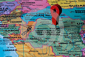 Red pin, point on the map of Democratic republic of the congo. Concept travel background.