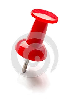 Red pin or thumbtack isolated on white background