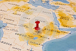 A Red Pin on Uganda of the World Map