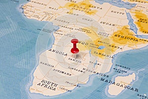 A Red Pin on Zambia of the World Map