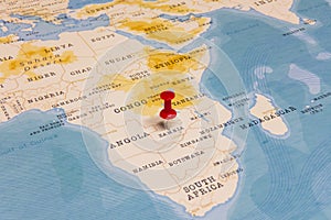 A Red Pin on Zambia of the World Map