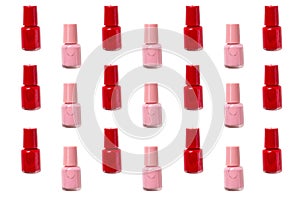 Red and pink nail polish on a white background. Isolated pattern