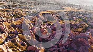 Red and Pink Rocks, Colourful Mountains, Birds eye view 4k aerial drone landscape. Dramatic geological wonder. Famous