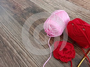 Red and pink thread knitting