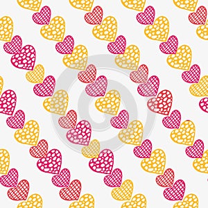 Red pink and yellow hearts lovely doodle seamless pattern with hand drawn vector illustration for textile, fabric