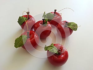 Red plastic apple ornaments