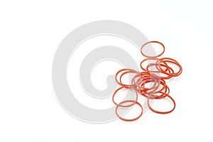 Red plastic band on white background