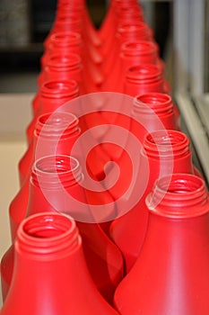 Red plastic bottles