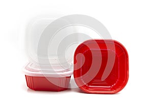 Red plastic box for food storage on a white background