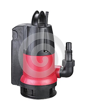 Red plastic drainage pump pumping water, with automatic built-in shut-off float, isolated white background. Flooded