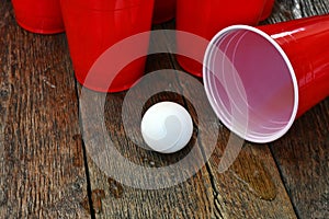 Red Plastic Drinking Cups and Spilled Beer