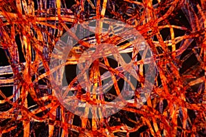 Red plastic fibers under the microscope