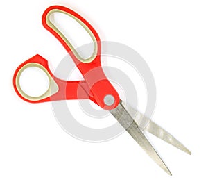 Red plastic office Scissors isolated on white