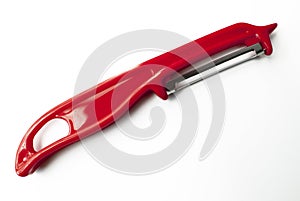 Red plastic potato peeler