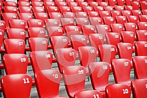 Red plastic seats in stadium