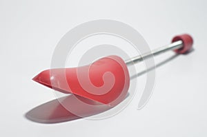 Red Plastic Shoe Tree on White Isolated Background