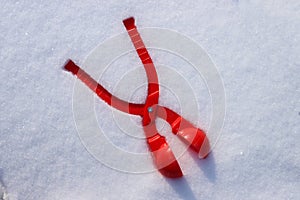 red plastic snowball maker on the white snow. The concept of winter holidays