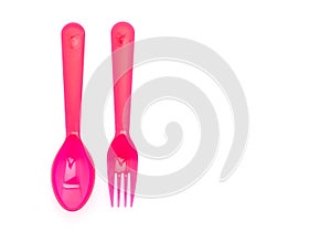 red plastic spoon and fork