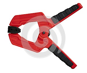 Red plastic spring clamp isolated on white