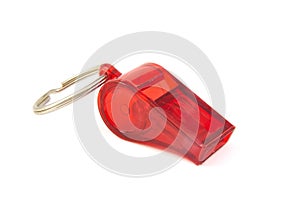 Red plastic whistle on white background