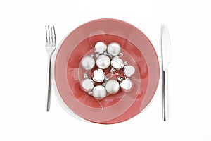 Red plate with Christmas silver ball