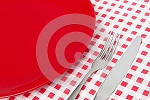 Red plate and cutlery