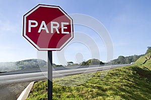 Red plate stop PARE transit sign