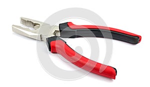 Red pliers isolated on white background.