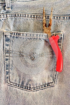 Red pliers in pocket