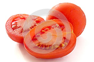 Red plum tomato cut in half