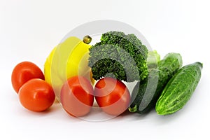 Lots of fresh vegetables for cooking different food on white background