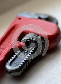 Red Plumbers wrench