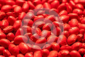 Red polymer dye in granules, background texture