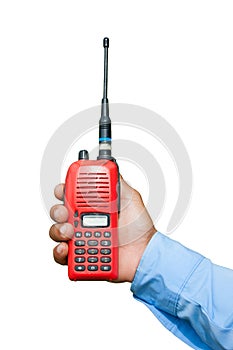 Red portable radio transceiver in hand