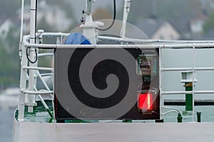 Red portside lantern light on a vessel ship