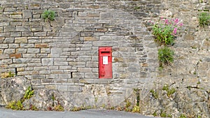 Red Post Box mounted in a wall