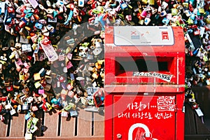 Seoul, South Korea - October 8, 2014: The close-up of a red post box of letter in the lock love key area at Namsan Tower N-Seoul