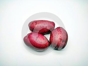 Red potato, isolated on white background