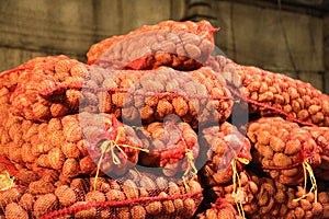 Red potato sacs in the warehouse for purchasing
