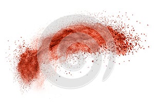 Red powder explosion isolated on white
